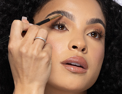 Angled brush with  built-in spoolie